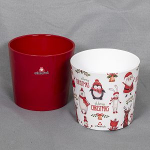 Punainen sekä valkoinen suojaruukku Merry Christmas tekstillä ja jouluisilla kuvioilla